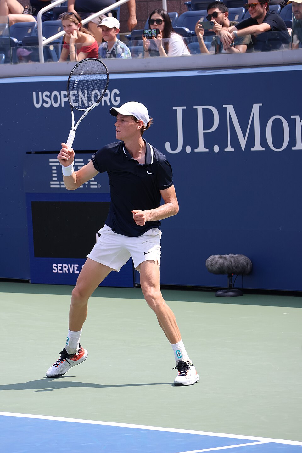 Jannik Sinner playing tennis at the 2024 US Open